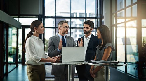 Shot of a group of businesspeople meeting in the office.